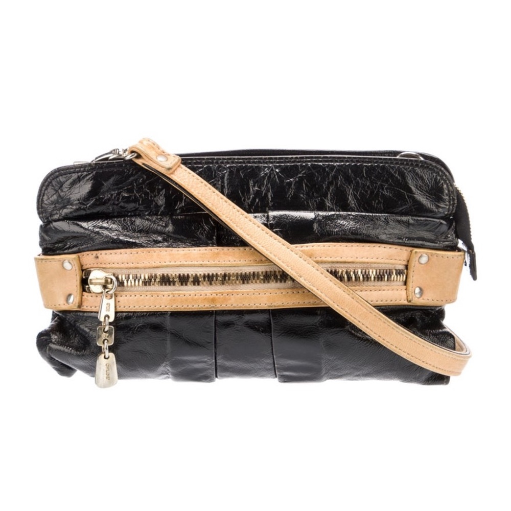 See by Chloé
Patent Leather Crossbody Bag 
Black and Tan Leather Women's…